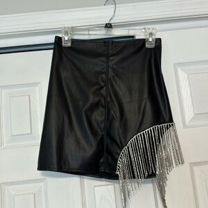 Say What black pleather mini skirt with rhinestone fringe